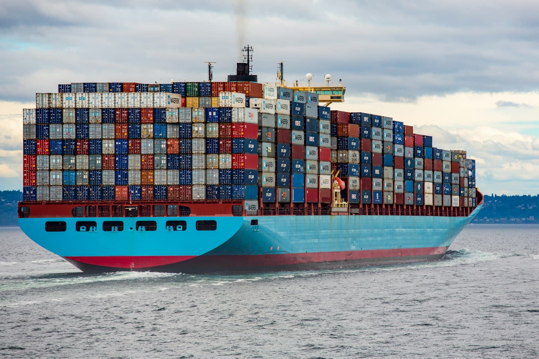 Container vessel loaded with containers at sea